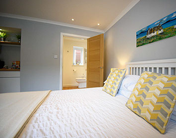 Medina Accommodation contains a King Size Double Bed with En Suite Shower Room
