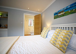 Medina Accommodation contains a King Size Double Bed with En Suite Shower Room