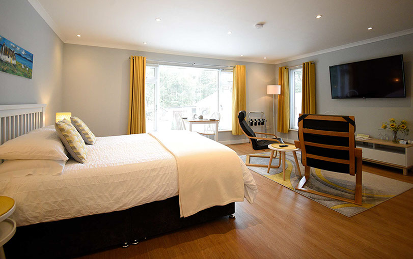 Medina Accommodation is an Open Plan Accommodation with Private Guest Seating Area and Widescreen Smart TV