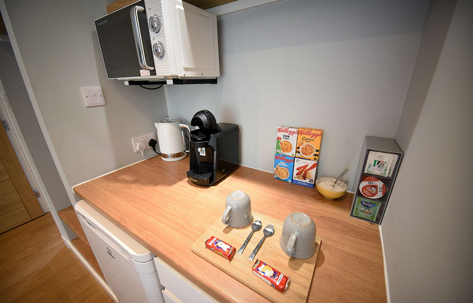 Medina Accommodation contains a Kitchenette with Microwave, Fridge, Freezer and Coffee Machine