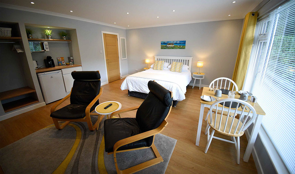 Medina Accommodation in Portree contains a King Size Double Bed and Private Seating Area